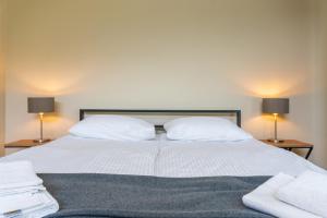 Letto o letti in una camera di Hotel Latveli Mestia