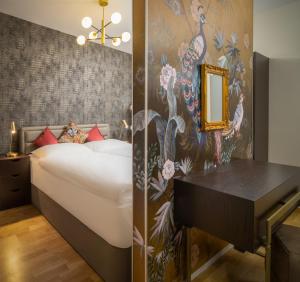 Llit o llits en una habitació de Abieshomes Serviced Apartments Schönbrunn