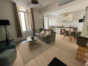 Posedenie v ubytovaní L’olivier - Appartement
