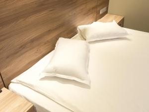 Cama ou camas em um quarto em Hotel Calipso Hotel