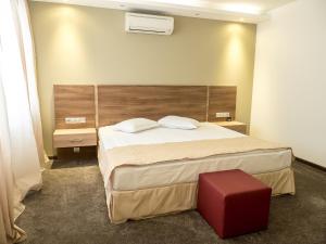 Cama ou camas em um quarto em Hotel Calipso Hotel