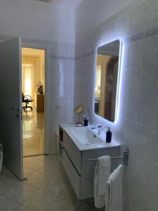 Koupelna v ubytování Al Capitello + 37 fotografií