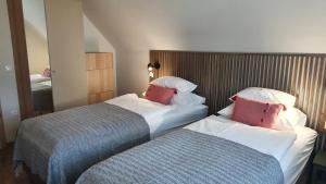Posteľ alebo postele v izbe v ubytovaní Relax Balaton Apartmanok + 37 fotografií