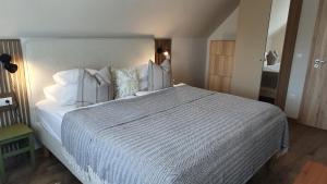 Posteľ alebo postele v izbe v ubytovaní Relax Balaton Apartmanok