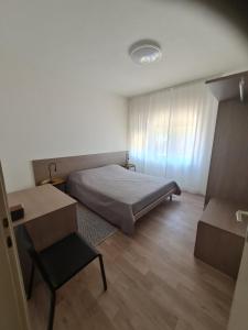 Posteľ alebo postele v izbe v ubytovaní Apartments Bianca