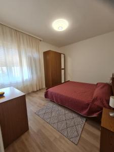 Posteľ alebo postele v izbe v ubytovaní Apartments Bianca
