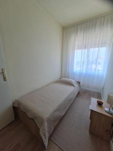 Postel nebo postele na pokoji v ubytování Apartments Bianca