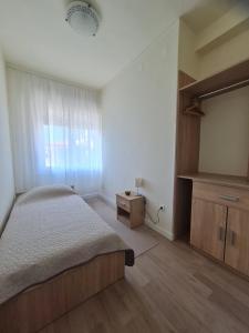 Postel nebo postele na pokoji v ubytování Apartments Bianca