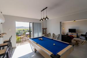 a living room with a pool table at Kleinbrak living - Ground floor unit in Klein Brak Rivier