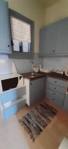 Kuchyňa alebo kuchynka v ubytovaní Aggelika's Home