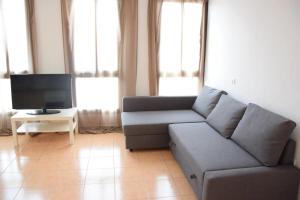 Posezení v ubytování Bonito y tranquilo apartamento en Los Abrigos