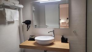 Koupelna v ubytování Theoxenia Hotel