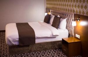 Postel nebo postele na pokoji v ubytování Park Hotel