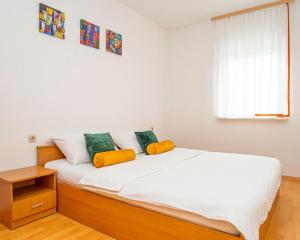 Postel nebo postele na pokoji v ubytování Apartments Baresic