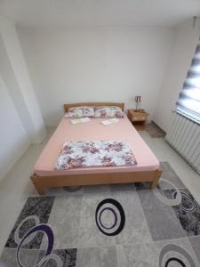 Una cama o camas en una habitación de Apartment Maida