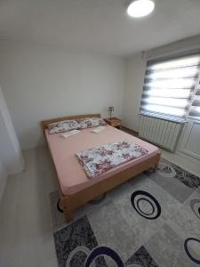 Postel nebo postele na pokoji v ubytování Apartment Maida