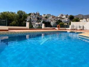 Bazén v ubytování Miramar Nerja - Luxury apartment near Burriana beach with pool nebo v jeho okolí