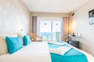 Postel nebo postele na pokoji v ubytování Hotel Ereza Mar - Adults Only