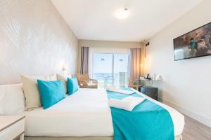 Postel nebo postele na pokoji v ubytování Hotel Ereza Mar - Adults Only