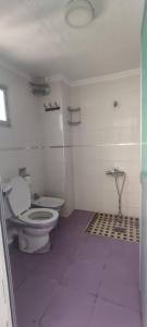 Um banheiro em Hotel Al Andalous
