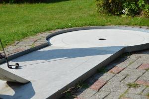 a skateboard on top of a cement ramp at Danhostel Nørresundby Skansen in Nørresundby