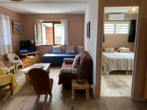 Ένα ή περισσότερα κρεβάτια σε δωμάτιο στο Villa Forbane en bord de plage