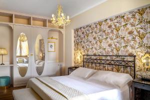 A bed or beds in a room at San Giovanni Terme Rapolano