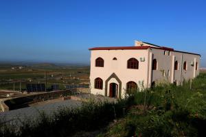 an old building on top of a hill at Maison d'Hôte - Le Beau Panorama in Berkane