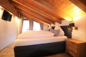 Кровать или кровати в номере Landhaus Am Schelmenhag 13a