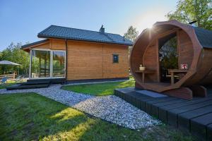 Vonkajšia záhrada v ubytovaní Apartamenty Białe Brzozy