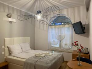 Ένα ή περισσότερα κρεβάτια σε δωμάτιο στο AL Mare-Villa z Basenem i klimatyzacją w CENIE POBYTU +110 φωτογραφίες