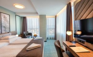 Posteľ alebo postele v izbe v ubytovaní Hunguest Hotel Bál Resort