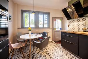 Η κουζίνα ή μικρή κουζίνα στο Domizil Apartment