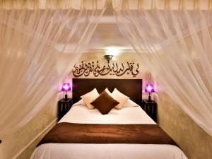 Voodi või voodid majutusasutuse Riad Casa Lalla toas