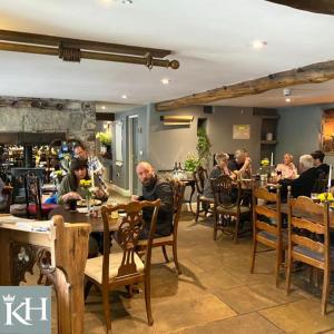 A restaurant or other place to eat at Kings Head - Riverside, Ravenstonedale