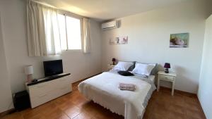 Posteľ alebo postele v izbe v ubytovaní Casa Paradiso Tropical