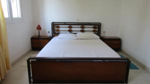 A bed or beds in a room at Sea La Vie