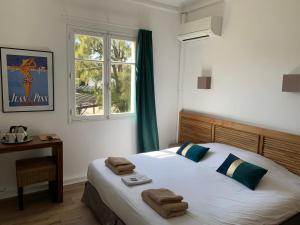 Ένα ή περισσότερα κρεβάτια σε δωμάτιο στο Hotel Alexandra - Boutique Hotel