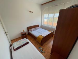 Giường trong phòng chung tại Eva Apartment 2