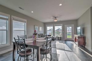 a dining room with a table and chairs at Lovely Bowling Green Home, 10 Mi to Downtown! in Bowling Green