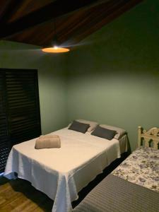Krevet ili kreveti u jedinici u objektu Pousada Villa Tropea - Fazenda Chapadão