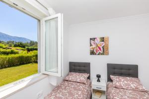 Nespecifikovaný výhled na hory nebo výhled na hory při pohledu z apartmánu