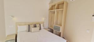 Posteľ alebo postele v izbe v ubytovaní Apartamentos MIRADOR DEL TRANSITO