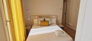 Posteľ alebo postele v izbe v ubytovaní Apartamentos MIRADOR DEL TRANSITO