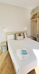 Posteľ alebo postele v izbe v ubytovaní Apartamentos MIRADOR DEL TRANSITO