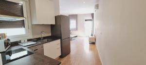 Kuchyňa alebo kuchynka v ubytovaní Apartamentos MIRADOR DEL TRANSITO