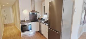 Kuchyňa alebo kuchynka v ubytovaní Apartamentos MIRADOR DEL TRANSITO