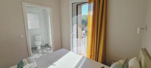 Posteľ alebo postele v izbe v ubytovaní Apartamentos MIRADOR DEL TRANSITO