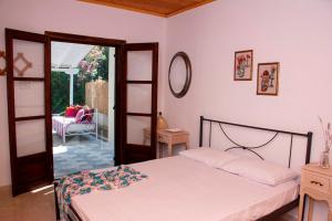 Giường trong phòng chung tại Casa Vista Al Mar