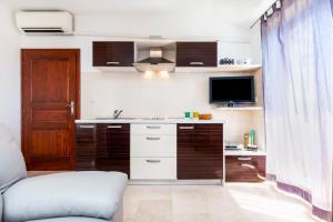 Kuchyň nebo kuchyňský kout v ubytování Guesthouse Santin